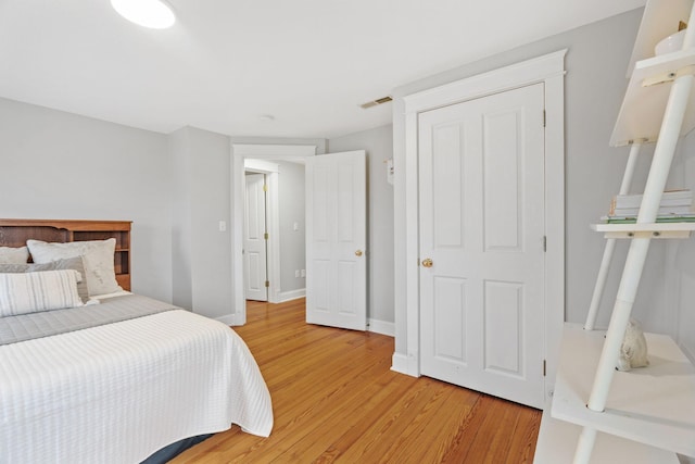 27151 Aberdeen Ave, New Prague, MN 56071 - bedroom featuring light wood-style floors and baseboards