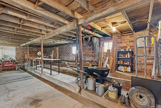 27151 Aberdeen Ave, New Prague, MN 56071 - misc room with concrete flooring and brick wall