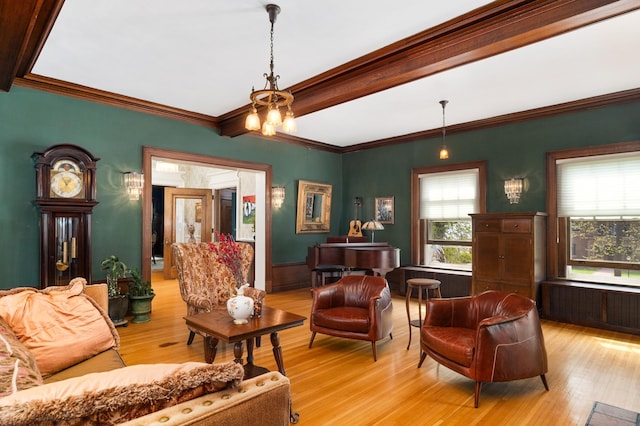 2525 2nd St, Duluth, MN 55812 - sitting room with light wood-type flooring, crown molding, and a chandelier