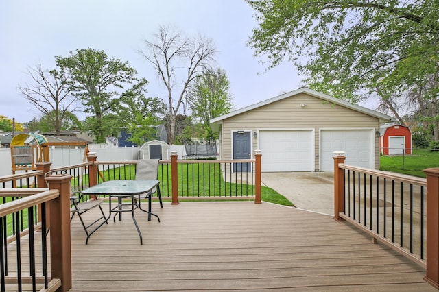 1821 4th Ave NE, Austin, MN 55912 - wooden terrace with a garage