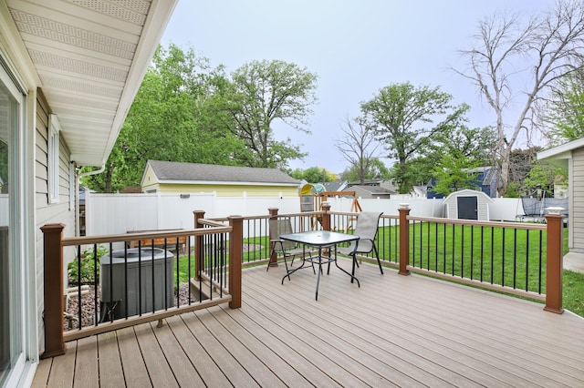 1821 4th Ave NE, Austin, MN 55912 - wooden deck featuring cooling unit and outdoor dining space