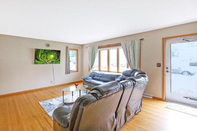 1821 4th Ave NE, Austin, MN 55912 - living room with light wood-style floors and baseboards