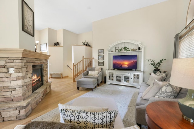 14925 Hillside Trl, Savage, MN 55378 - living area featuring light wood finished floors and a fireplace