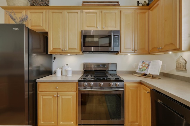 14925 Hillside Trl, Savage, MN 55378 - kitchen with appliances with stainless steel finishes, beverage cooler, and light countertops