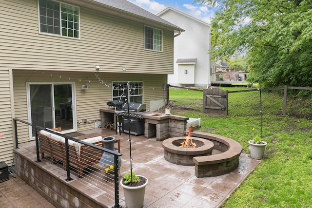 14925 Hillside Trl, Savage, MN 55378 - view of patio / terrace with an outdoor fire pit, a grill, and a gate