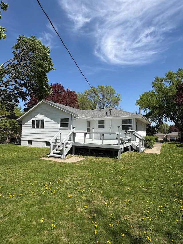 2220 23rd St NW, Rochester, MN 55901 - rear view of property featuring a lawn and a deck