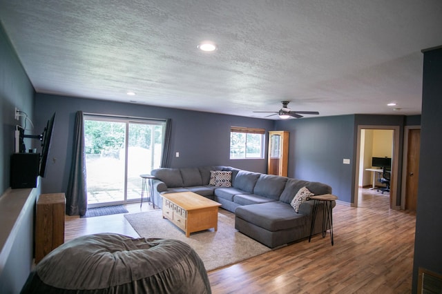 450 Meadow Ln, Somerset, WI 54025 - living room featuring plenty of natural light, a textured ceiling, wood finished floors, a ceiling fan, and recessed lighting