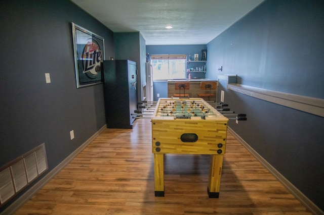 450 Meadow Ln, Somerset, WI 54025 - rec room with wood finished floors, baseboards, and recessed lighting