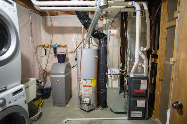 450 Meadow Ln, Somerset, WI 54025 - utility room with gas water heater and stacked washer and clothes dryer