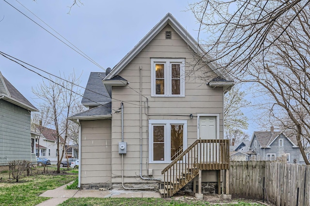 1156 Marion St, Saint Paul, MN 55117 - rear view of property featuring roof with shingles