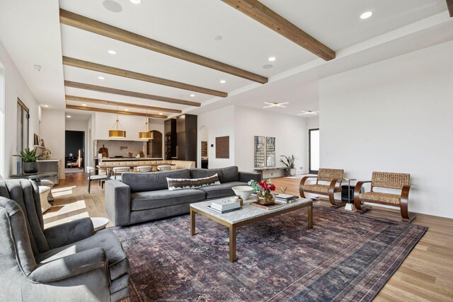 6297 Yuma Ln N, Maple Grove, MN 55311 - living area with light wood-style floors, beamed ceiling, and recessed lighting
