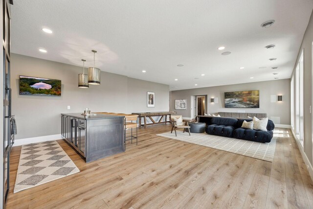 6297 Yuma Ln N, Maple Grove, MN 55311 - living room featuring light wood-style flooring, recessed lighting, and baseboards
