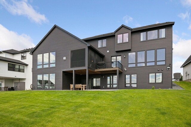 6297 Yuma Ln N, Maple Grove, MN 55311 - rear view of house featuring central air condition unit and a yard