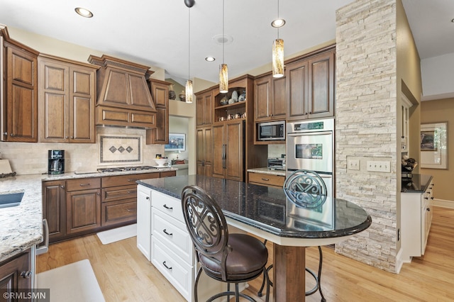 12143 Gantry Ln, Apple Valley, MN 55124 - kitchen with appliances with stainless steel finishes, open shelves, light wood-style flooring, decorative backsplash, and recessed lighting