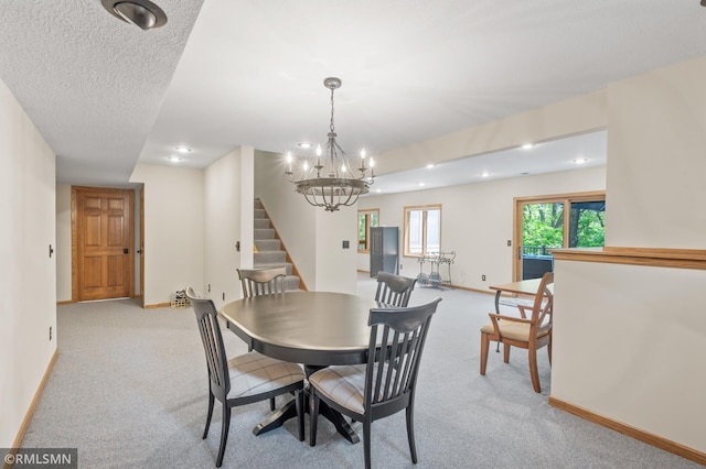 12143 Gantry Ln, Apple Valley, MN 55124 - dining room with stairway, baseboards, light colored carpet, a chandelier, and recessed lighting