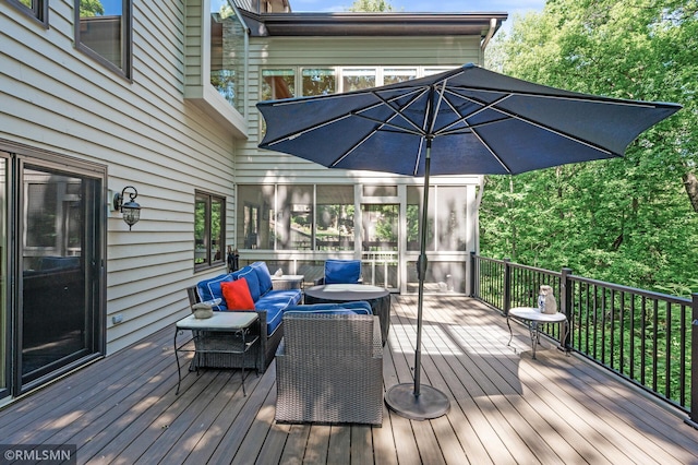 12143 Gantry Ln, Apple Valley, MN 55124 - wooden deck with an outdoor living space and a sunroom