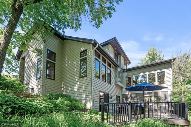 12143 Gantry Ln, Apple Valley, MN 55124 - rear view of house with a deck