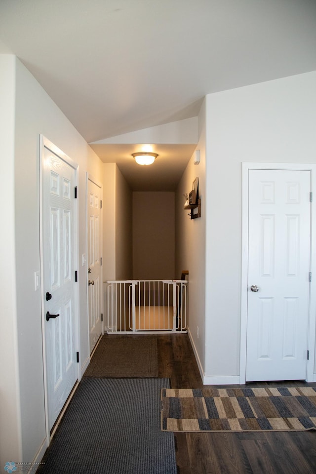 2700 14th St W, West Fargo, ND 58078 - hallway featuring an upstairs landing, wood finished floors, and baseboards