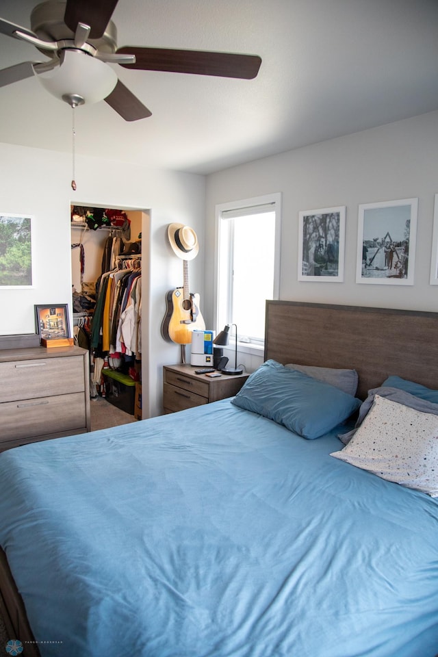2700 14th St W, West Fargo, ND 58078 - bedroom featuring a spacious closet, a closet, and ceiling fan