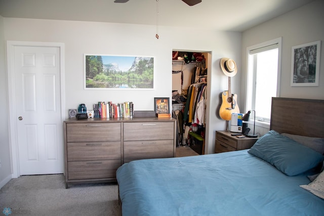 2700 14th St W, West Fargo, ND 58078 - bedroom with a walk in closet, carpet, a closet, and a ceiling fan