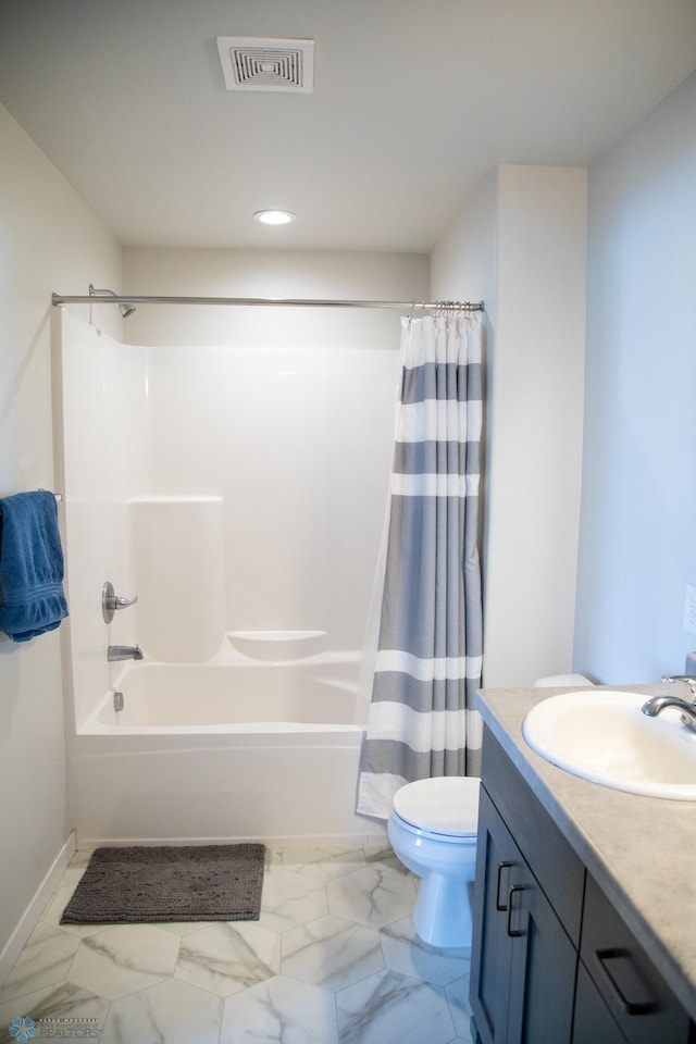 2700 14th St W, West Fargo, ND 58078 - full bathroom featuring shower / bath combo with shower curtain, toilet, vanity, marble finish flooring, and recessed lighting