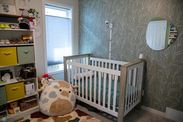 2700 14th St W, West Fargo, ND 58078 - bedroom with wallpapered walls and a nursery area