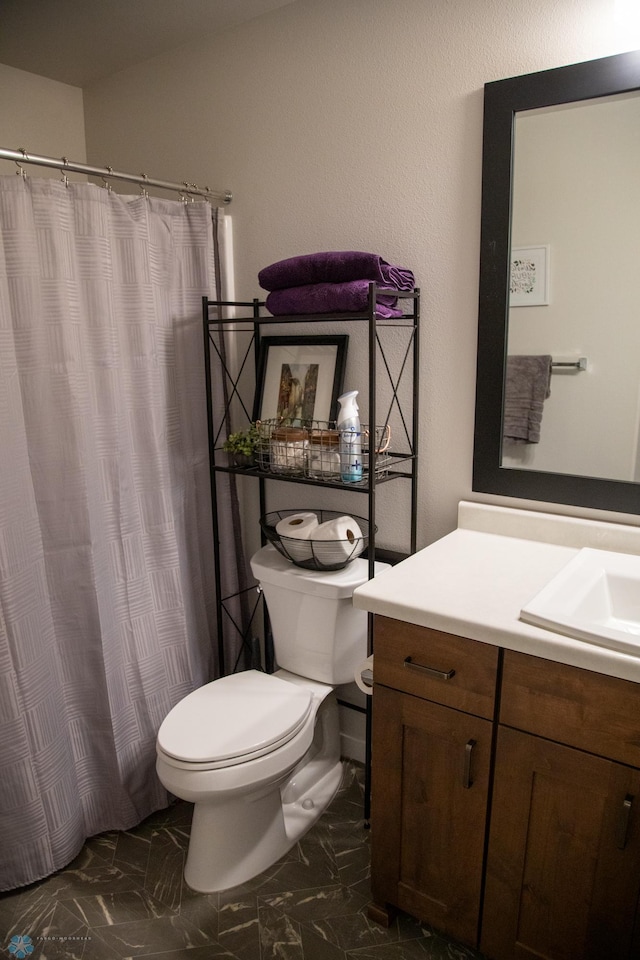 2700 14th St W, West Fargo, ND 58078 - bathroom with vanity, marble look tiles, toilet, and a shower with curtain