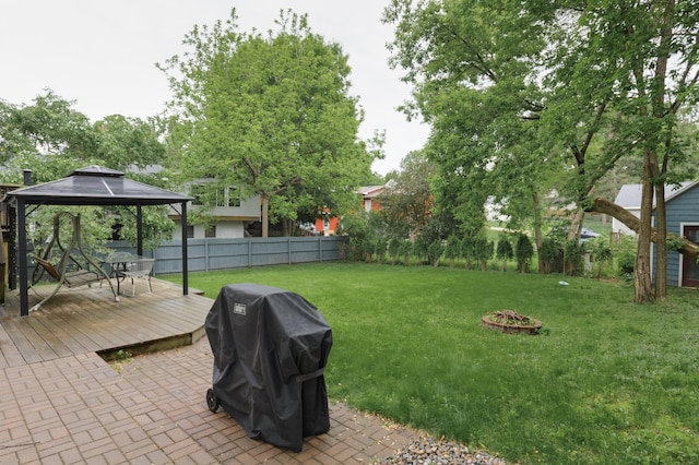 1712 Levee Ave, Anoka, MN 55303 - view of yard with an outdoor fire pit, a gazebo, a deck, and a patio area