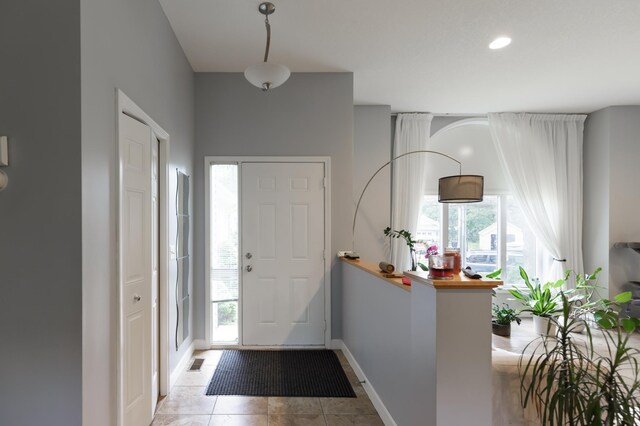 1712 Levee Ave, Anoka, MN 55303 - foyer featuring baseboards and light tile patterned floors