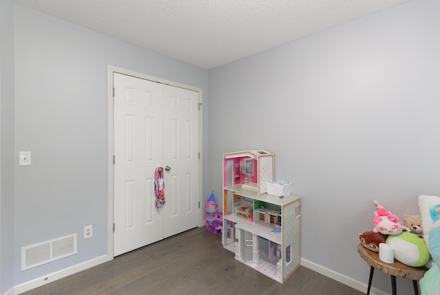 1712 Levee Ave, Anoka, MN 55303 - playroom featuring wood finished floors and baseboards