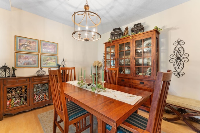 14518 Florissant Path Unit 3090, Apple Valley, MN 55124 - dining room featuring a chandelier and light wood-type flooring