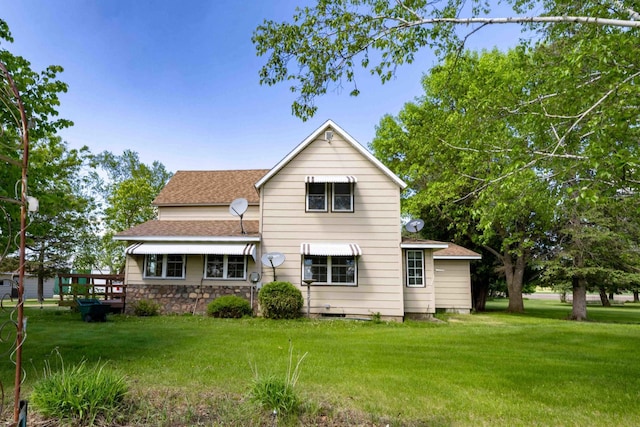 44655 Red Oak Rd, Staples, MN 56479 - rear view of property featuring a shingled roof and a lawn