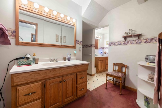 44655 Red Oak Rd, Staples, MN 56479 - full bathroom featuring two vanities and lofted ceiling