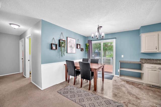 5019 Washington St NE, Columbia Heights, MN 55421 - dining space with a chandelier and a textured ceiling