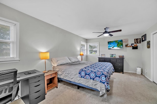 5019 Washington St NE, Columbia Heights, MN 55421 - bedroom with light carpet, a ceiling fan, and a desk