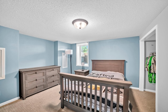 5019 Washington St NE, Columbia Heights, MN 55421 - bedroom featuring light colored carpet and a textured ceiling