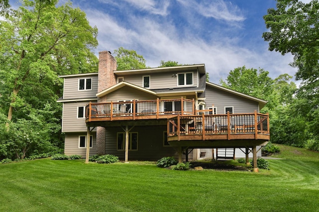 19260 81st Pl N, Maple Grove, MN 55311 - rear view of house featuring a wooden deck, a chimney, and a lawn