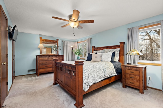 19260 81st Pl N, Maple Grove, MN 55311 - bedroom with light colored carpet, baseboards, and ceiling fan