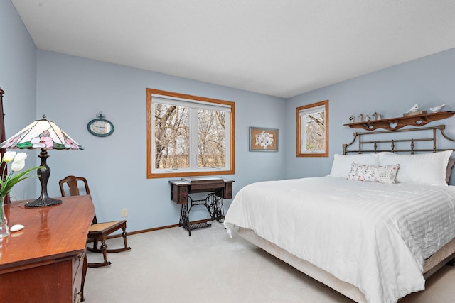 19260 81st Pl N, Maple Grove, MN 55311 - bedroom with multiple windows, carpet flooring, and baseboards