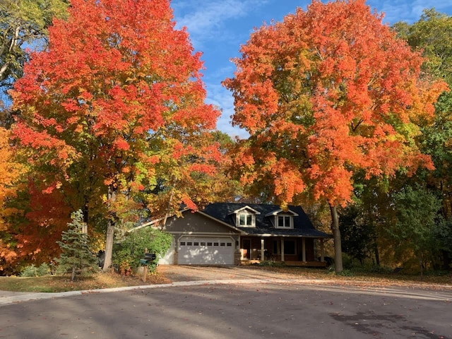 19260 81st Pl N, Maple Grove, MN 55311 - view of front of property with a porch and an attached garage