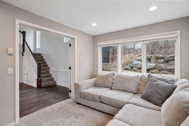 3715 Huntingdon Dr, Minnetonka, MN 55305 - carpeted living room featuring stairs, plenty of natural light, recessed lighting, baseboards, and wood finished floors