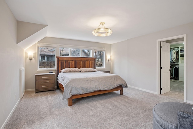 3715 Huntingdon Dr, Minnetonka, MN 55305 - bedroom featuring light carpet, baseboards, and a spacious closet