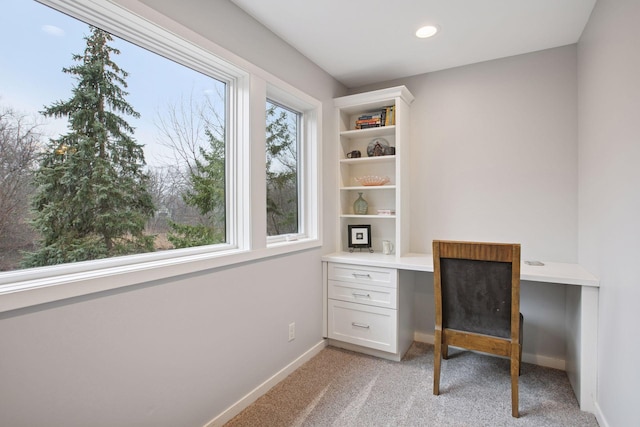 3715 Huntingdon Dr, Minnetonka, MN 55305 - unfurnished office with light carpet, baseboards, built in desk, and recessed lighting
