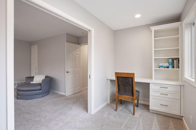 3715 Huntingdon Dr, Minnetonka, MN 55305 - home office with built in desk, light colored carpet, baseboards, and recessed lighting