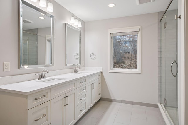 3715 Huntingdon Dr, Minnetonka, MN 55305 - full bathroom with double vanity, a tile shower, baseboards, tile patterned flooring, and recessed lighting