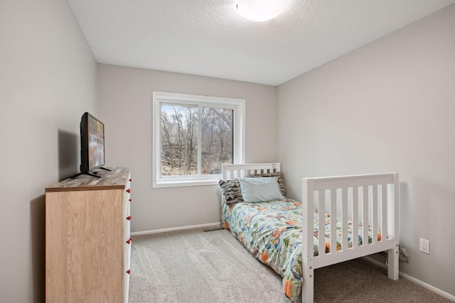 3715 Huntingdon Dr, Minnetonka, MN 55305 - carpeted bedroom featuring baseboards and a textured ceiling