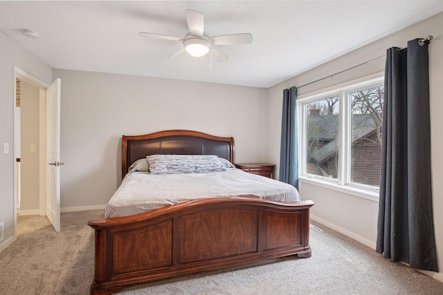 3715 Huntingdon Dr, Minnetonka, MN 55305 - bedroom featuring light carpet, baseboards, and ceiling fan