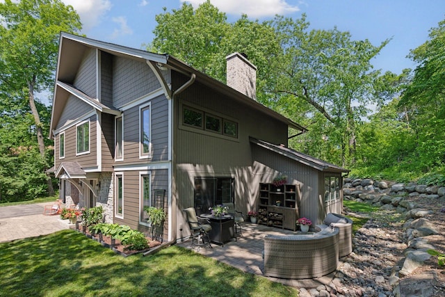 3715 Huntingdon Dr, Minnetonka, MN 55305 - rear view of property with a patio and a chimney