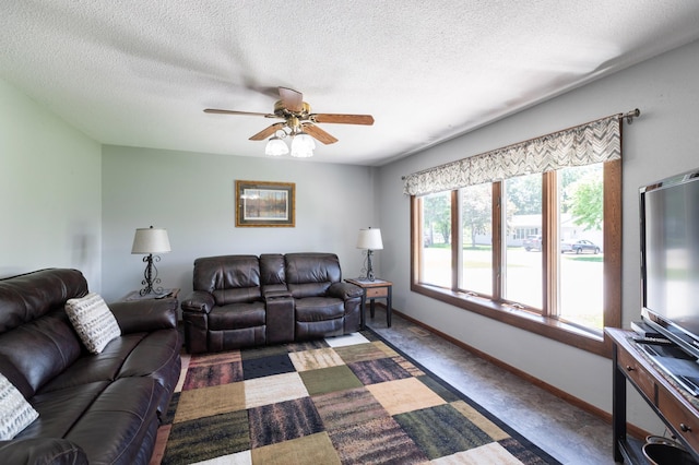 32 7th St, Buffalo City, WI 54622 - living room with ceiling fan, a textured ceiling, and carpet