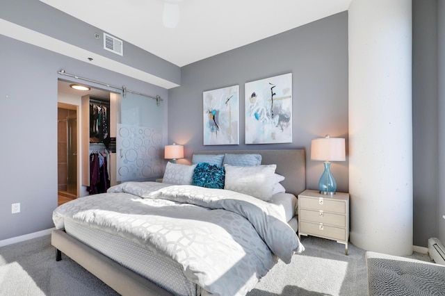 740 Portland Ave Unit 907, Minneapolis, MN 55415 - carpeted bedroom with a spacious closet, a closet, and baseboards